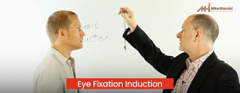 One Man Hypnotizing Another Using An Eye Fixation Hypnotic Induction